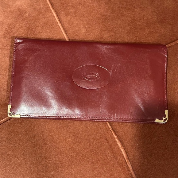 Cartier Handbags - Cartier Burgundy Leather Le Must De Cartier Long Wallet
